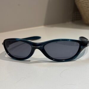 Oakley Teal Sunglasses with Polarized Lenses